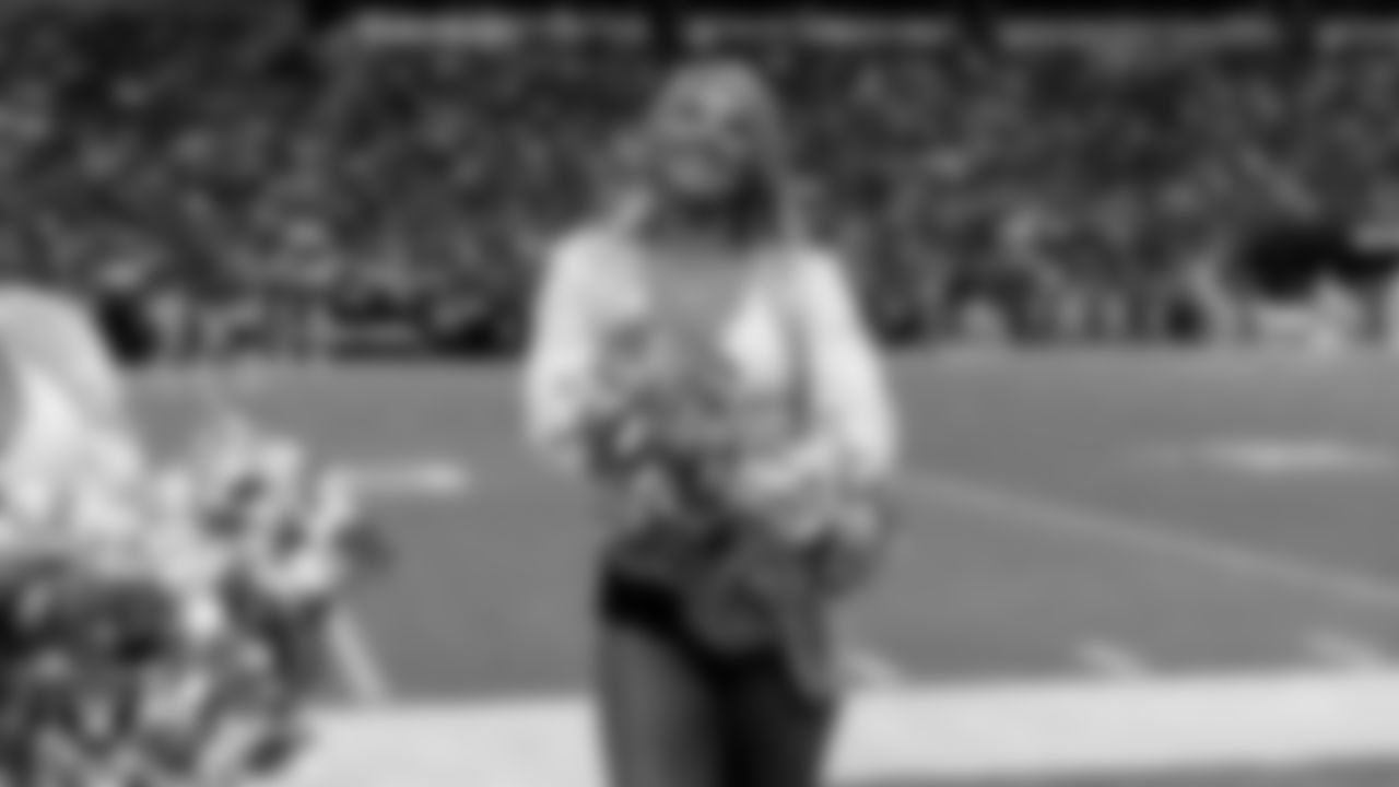 Raiderette Cori on the sidelines during the regular season home game against the Cleveland Browns at Allegiant Stadium.