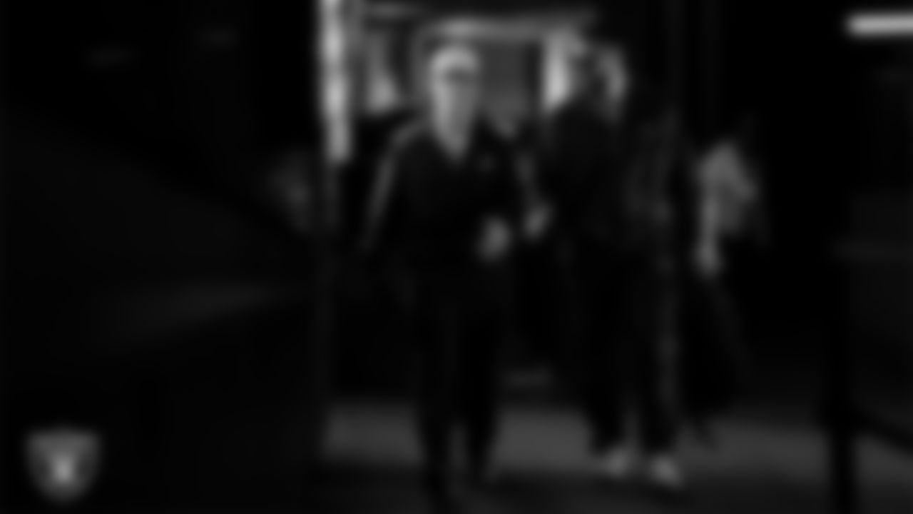 Las Vegas Raiders running back Dylan Laube (23) and linebacker Jon Rhattigan (59) arrive to the regular season home game against the Kansas City Chiefs at Allegiant Stadium.