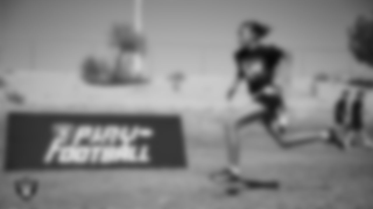 An athlete takes part in a drill after a partnership announcement between the Las Vegas Raiders and Clark County School District as a Silver and Black Flag Football league at the middle school level at Sig Rogich Middle School.