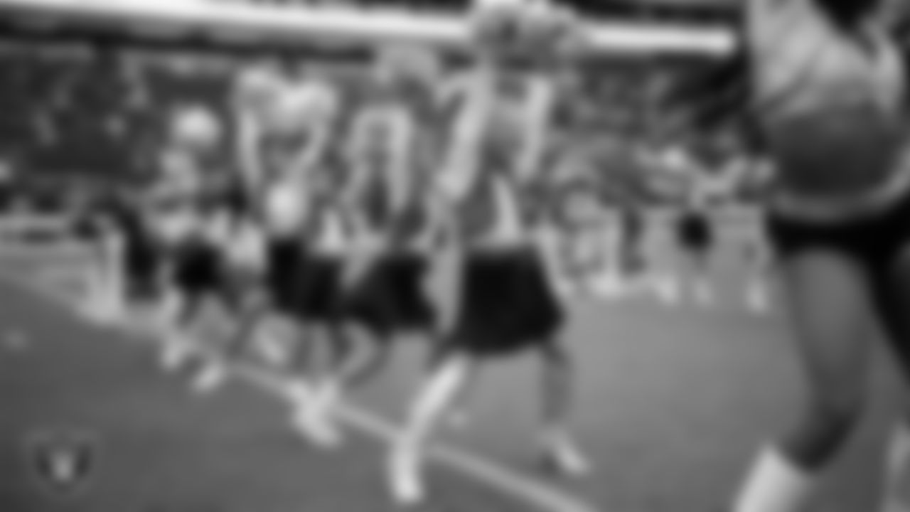 Junior Raiderettes perform on the field before the preseason home game against the San Francisco 49ers at Allegiant Stadium.