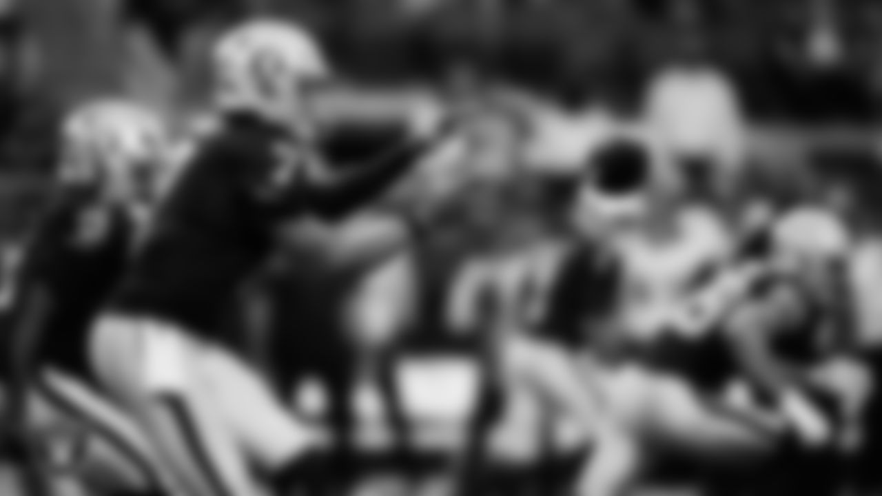 Las Vegas Raiders quarterback Geno Smith (7) receives the snap during the regular season home game against the Jacksonville Jaguars at Allegiant Stadium.