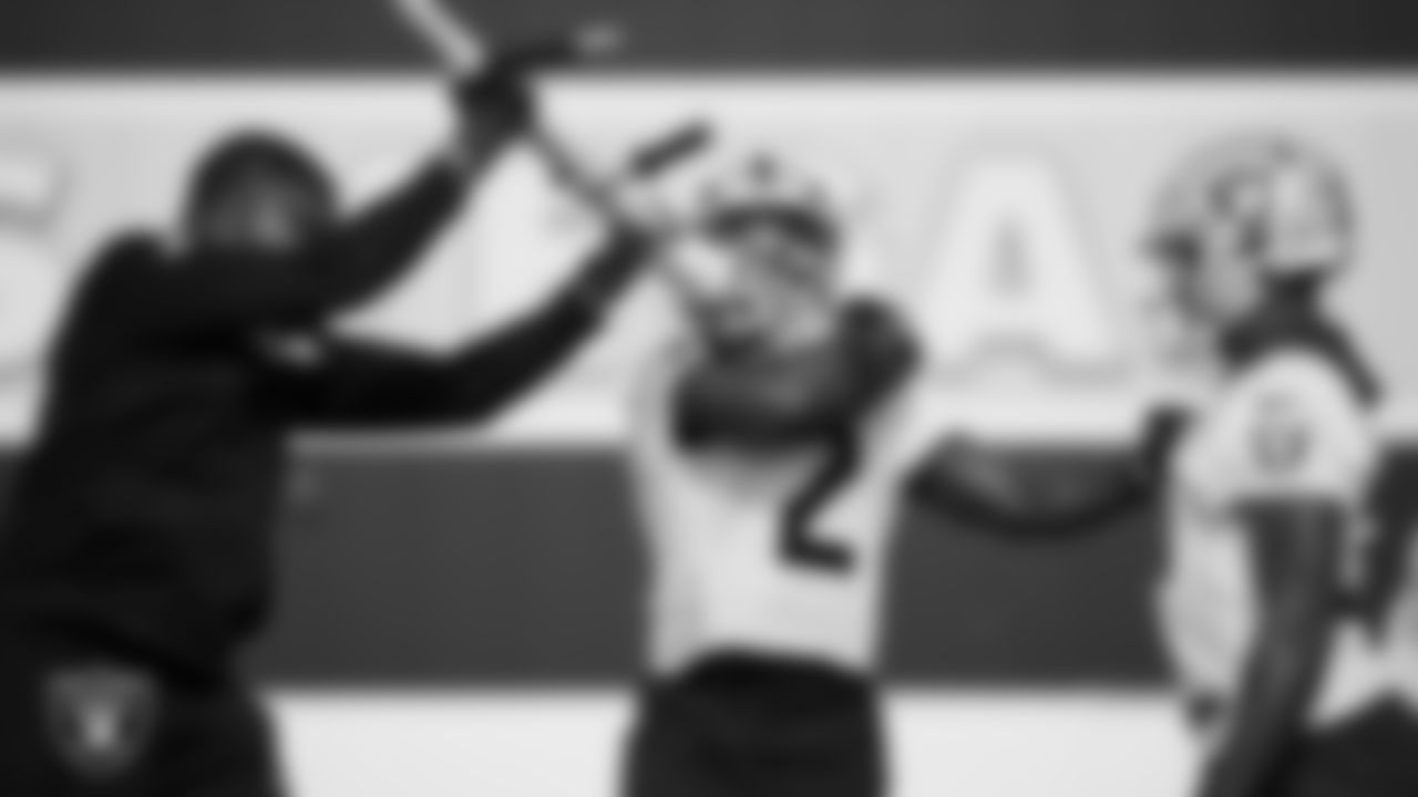 Las Vegas Raiders running backs coach Deland McCullough, running back Ashton Jeanty (2) and running back Raheem Mostert (31) during practice at Intermountain Health Performance Center.