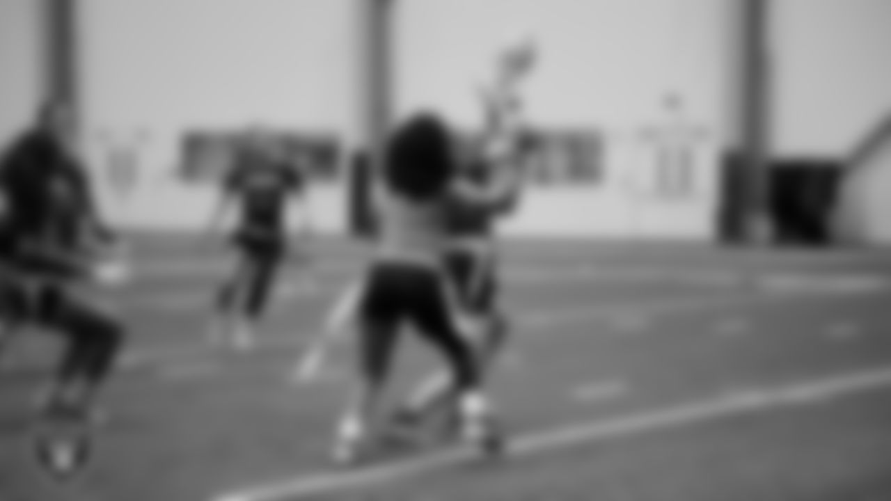 Athletes compete in the Silver and Black Championship game during Play Football Day at Intermountain Health Performance Center.