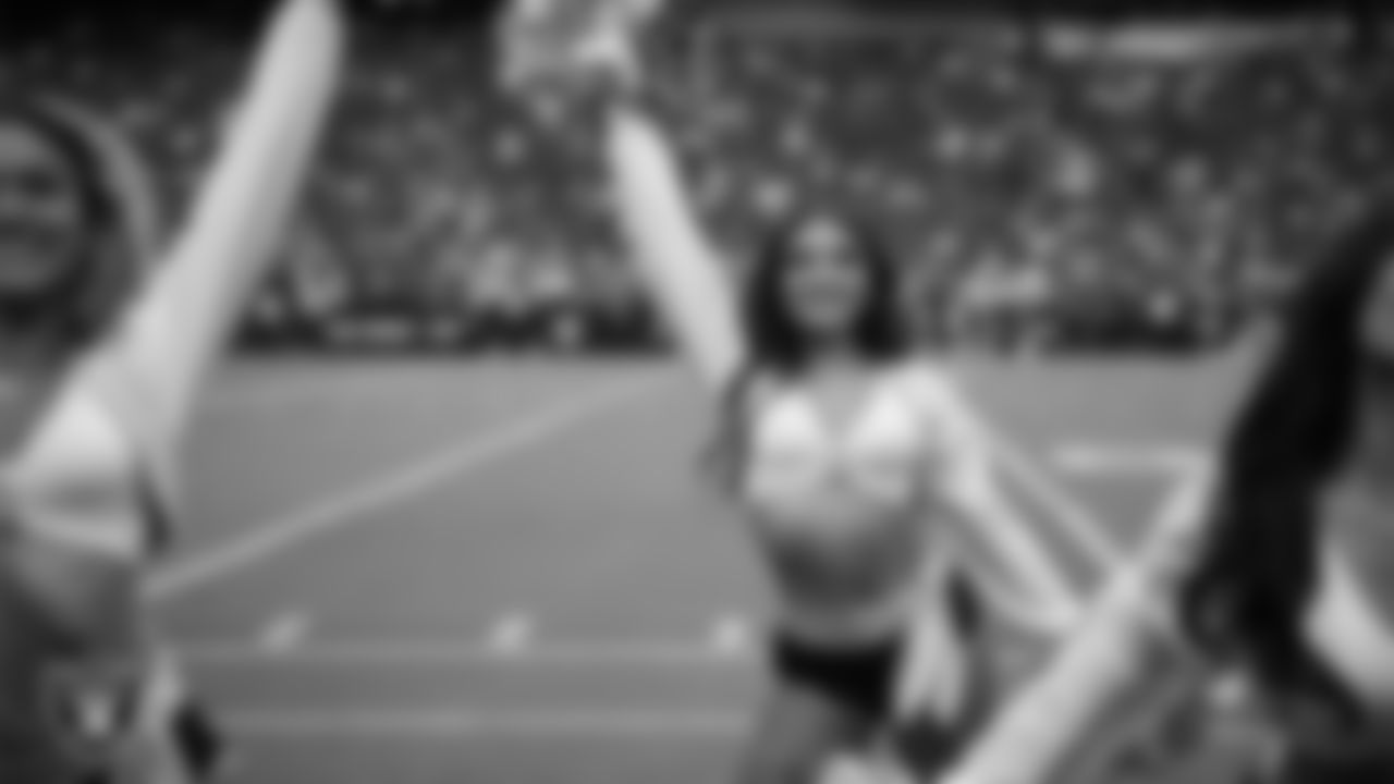 Raiderette Sloane on the sidelines during a 2025 Training Camp mock game at Allegiant Stadium.