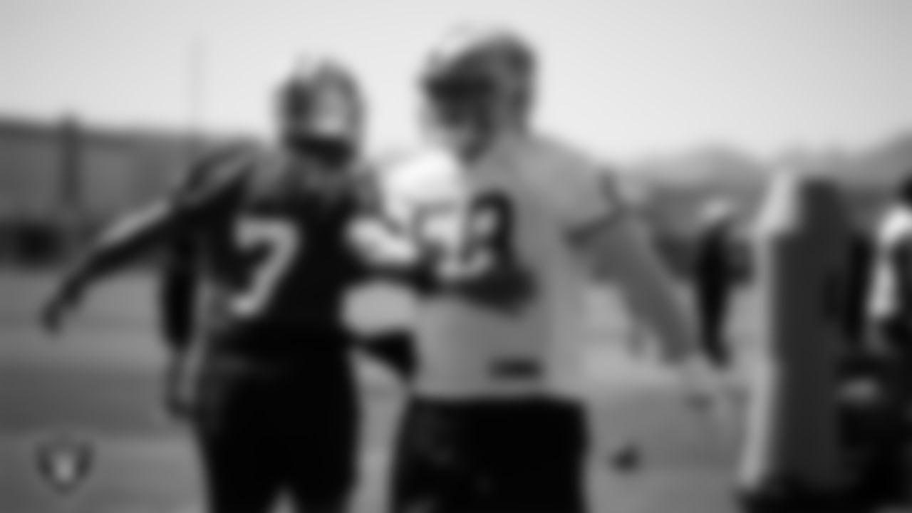 Las Vegas Raiders quarterback Geno Smith (7) and center/guard Jackson Powers-Johnson (58) at an Organized Team Activity (OTA) at Intermountain Health Performance Center.