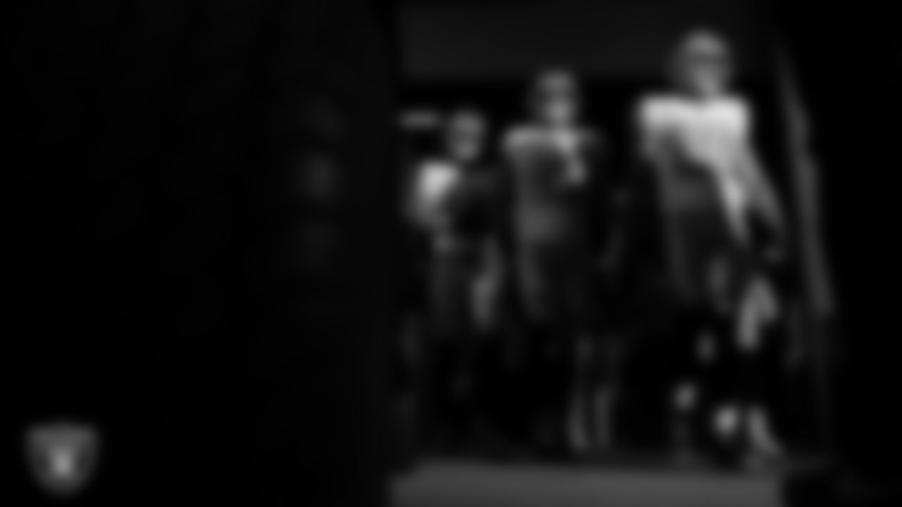 Las Vegas Raiders wide receiver Jack Bech (18), tight end Michael Mayer (87) and tight end Brock Bowers (89) walk down the tunnel before the regular season away game against the Denver Broncos at Empower Field at Mile High.