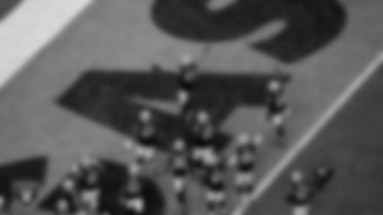 Las Vegas Raiders defensive end Charles Snowden (49) celebrates after intercepting a pass during the regular season home game against the Cleveland Browns at Allegiant Stadium.