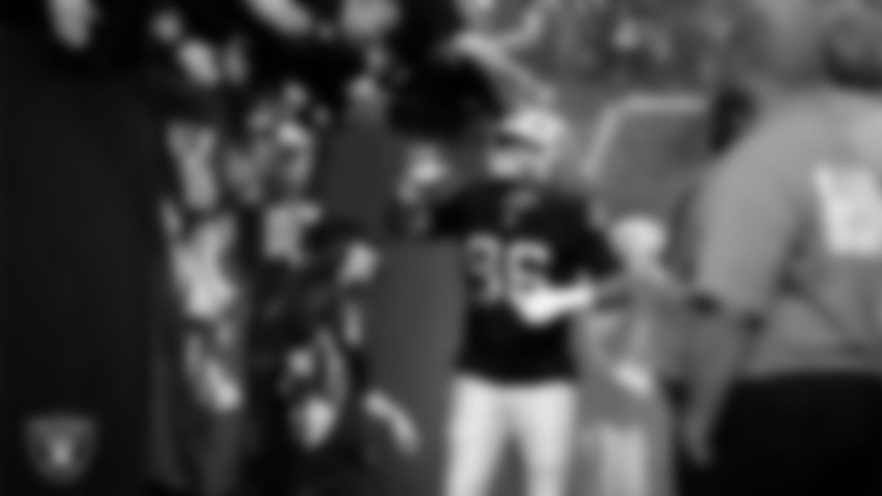 Las Vegas Raiders defensive tackle Jonah Laulu (96) is introduced onto the field before the regular season home game against the Kansas City Chiefs at Allegiant Stadium.