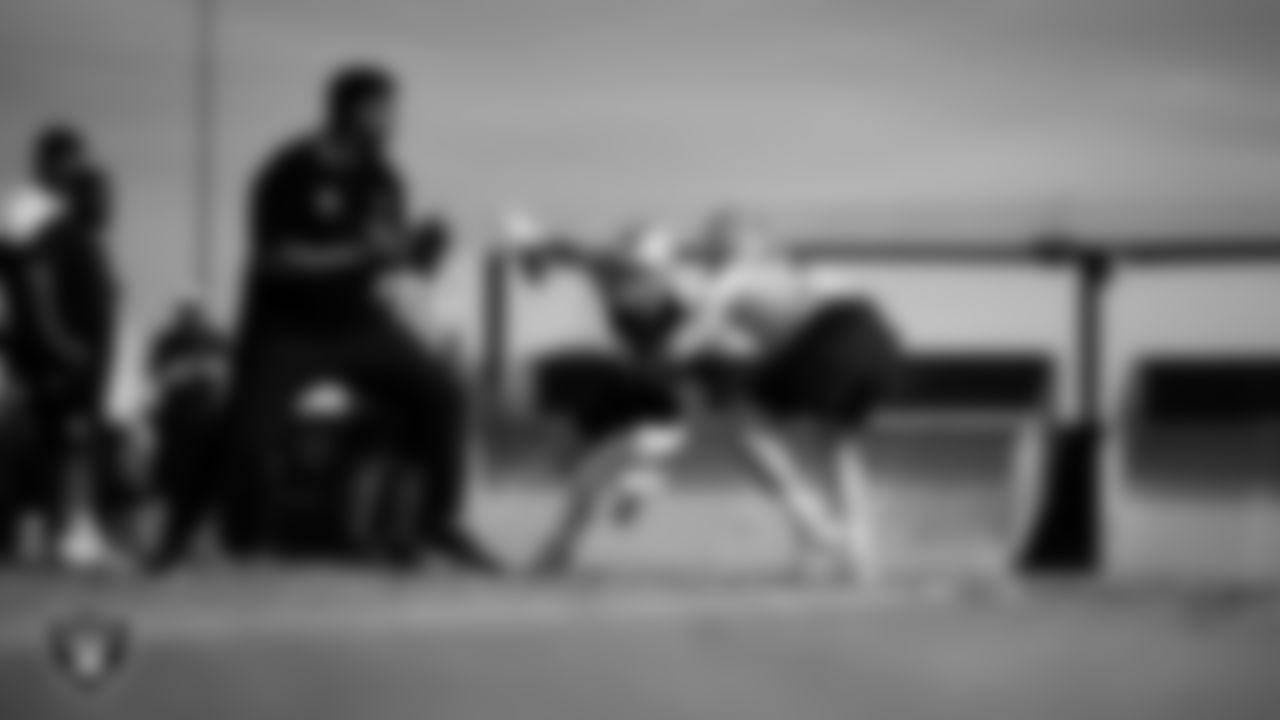 Las Vegas Raiders defensive end Maxx Crosby (98) and tackle Kolton Miller (74) during practice at Intermountain Health Performance Center.