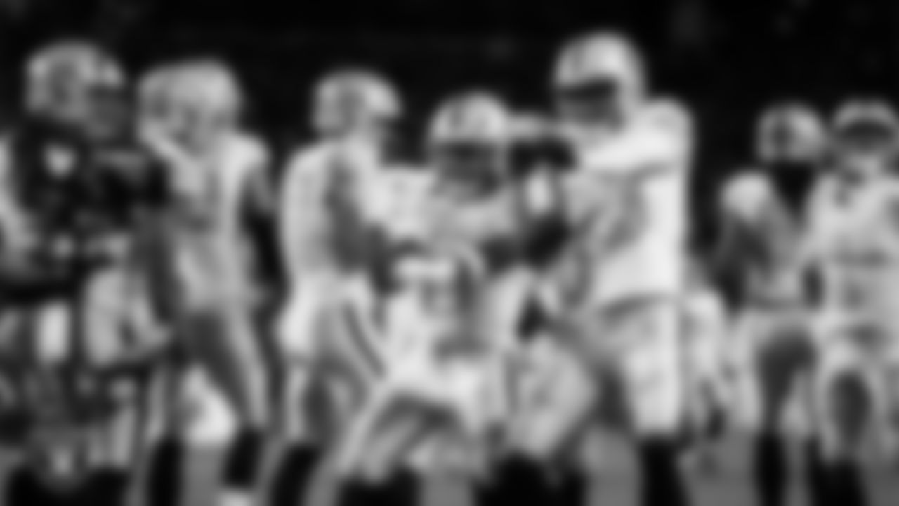 Las Vegas Raiders running back Ashton Jeanty (2) celebrates with wide receiver Dont'e Thornton Jr. (10) after rushing for a 4-yard touchdown during the regular season away game against the Denver Broncos at Empower Field at Mile High.