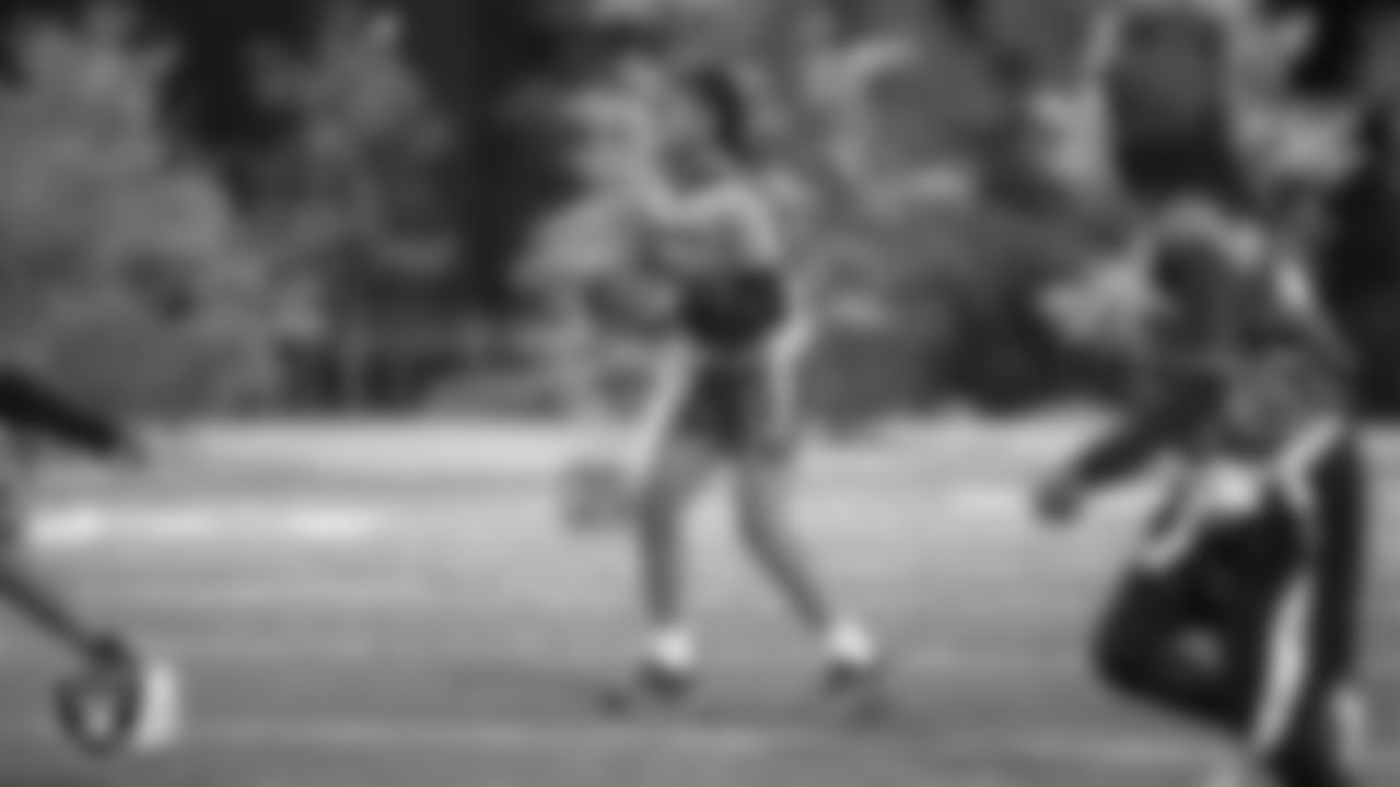 Athletes from the East Division and West Division of the City of Las Vegas Silver and Black Youth Flag Football League compete in the championship game at All American Park.