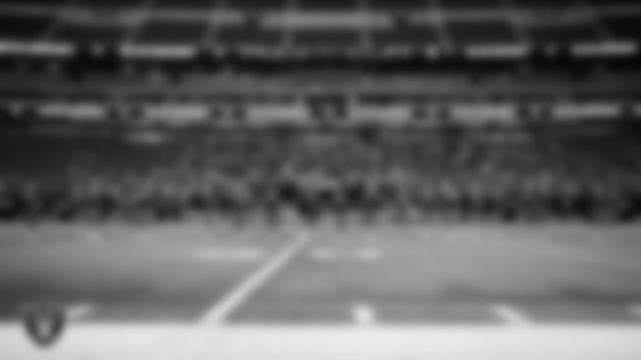 The McQueen High School cheer team performs during the NIAA 4A Division State Championship game at Allegiant Stadium.