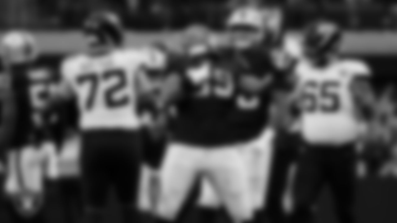 Las Vegas Raiders defensive tackle Adam Butler (69) celebrates after making a tackle during the regular season home game against the Jacksonville Jaguars at Allegiant Stadium.