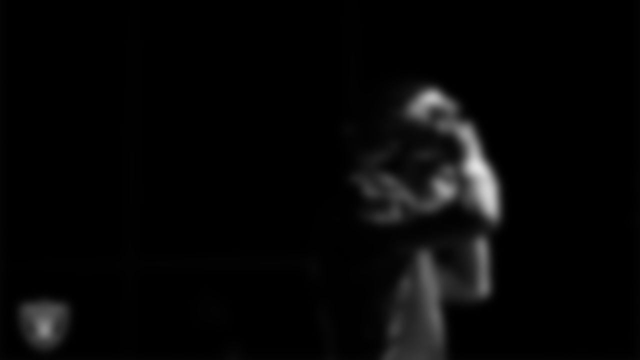 Las Vegas Raiders quarterback Kenny Pickett (15) walks out to the field for practice at Intermountain Health Performance Center.