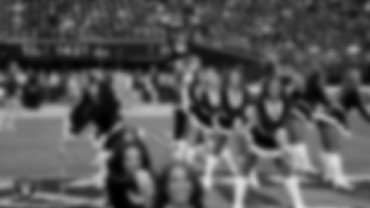 Raiderette Jenna and dancer Oscar Ortega-Hernandez perform on the field before the regular season home game against the New York Giants at Allegiant Stadium.