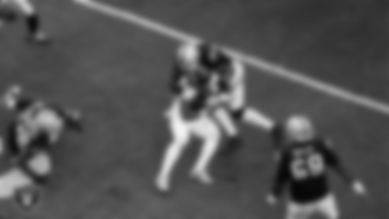 Las Vegas Raiders linebacker Jamal Adams (33) makes a tackle during the regular season home game against the Tennessee Titans at Allegiant Stadium.