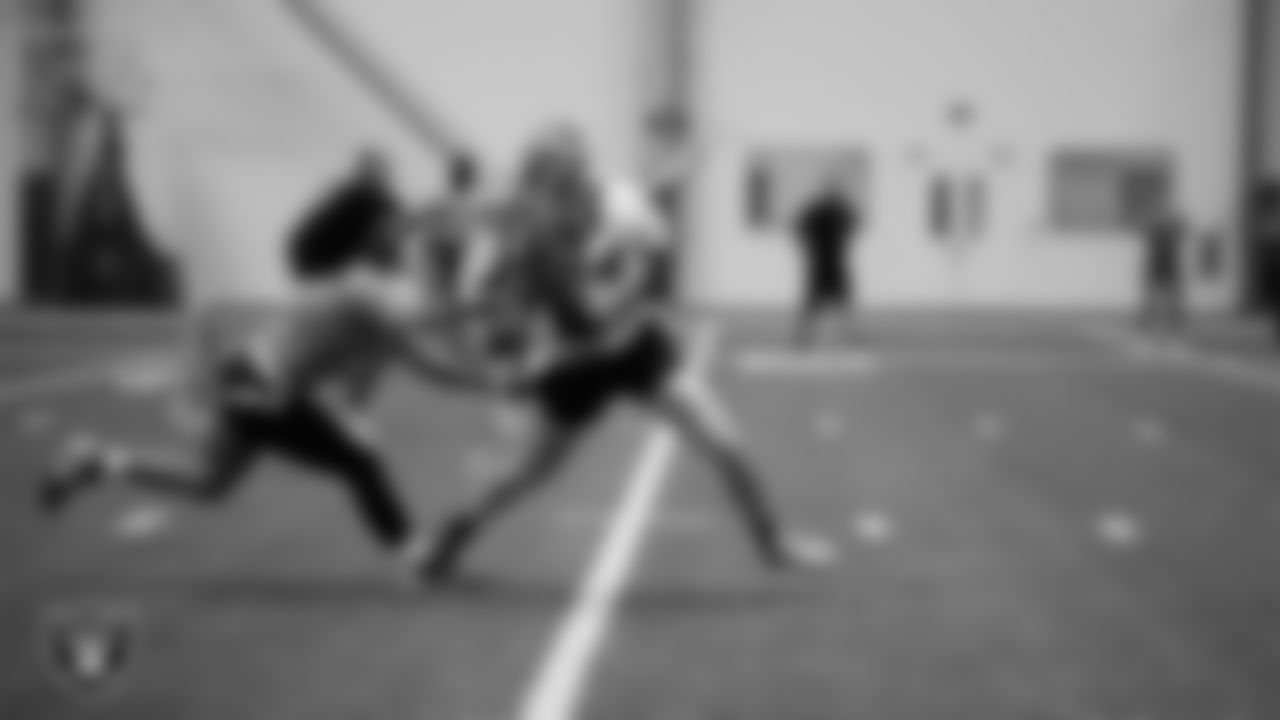 Athletes compete in the Silver and Black Championship game during Play Football Day at Intermountain Health Performance Center.