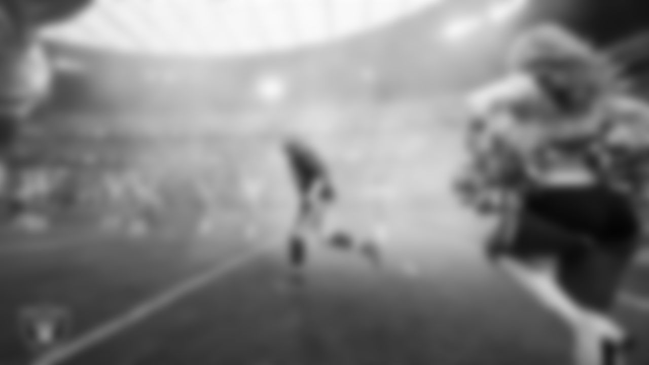 Las Vegas Raiders defensive tackle Adam Butler (69) is introduced onto the field before the regular season home game against the Denver Broncos at Allegiant Stadium.