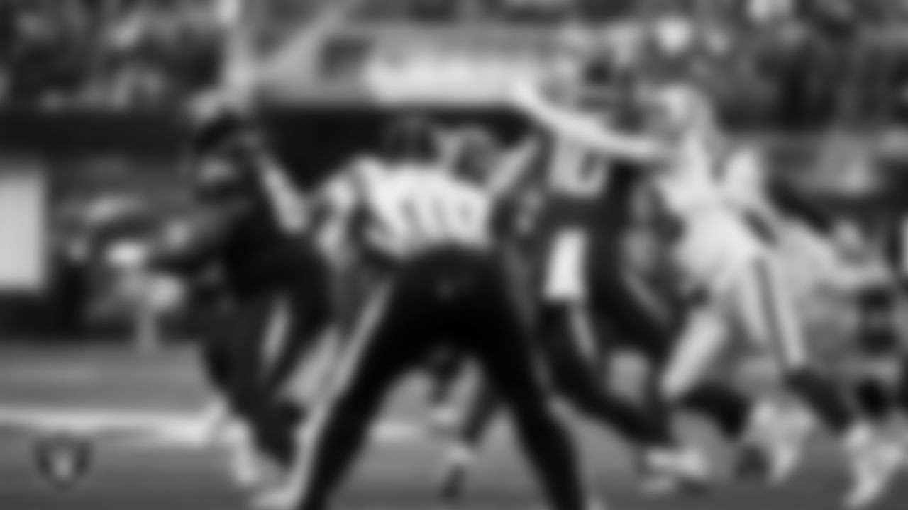 Las Vegas Raiders defensive end Maxx Crosby (98) sacks the quarterback during the regular season away game against the Los Angeles Chargers at SoFi Stadium.