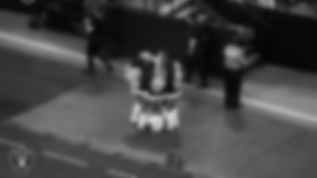 Line 3 of the Raiderettes celebrates Raiderette Devyn being honored as Raiderette of the Game during the regular season home game against the New York Giants at Allegiant Stadium.