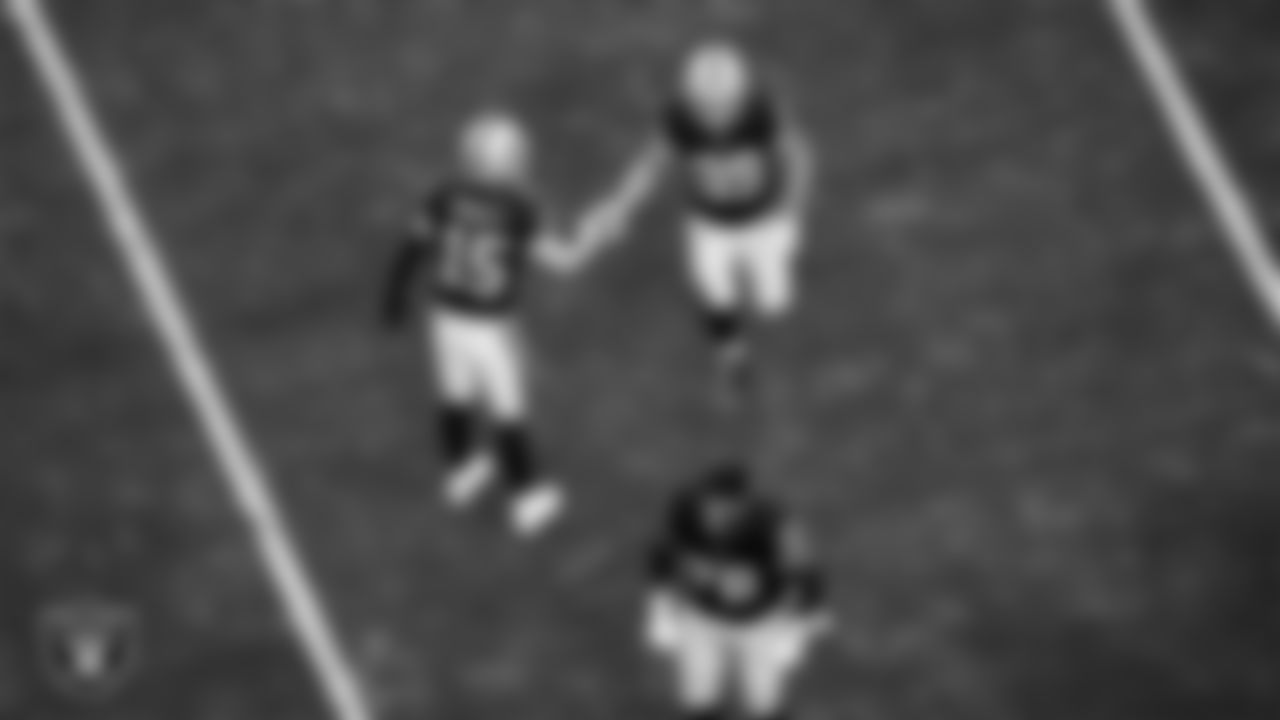 Las Vegas Raiders tight end Brock Bowers (89) celebrates with quarterback Kenny Pickett (15) after making a 15-yard touchdown catch during the regular season home game against the Denver Broncos at Allegiant Stadium.