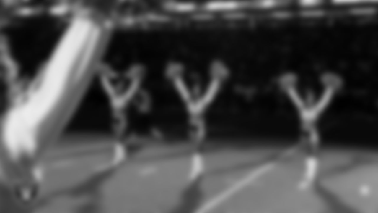 Raiderettes Sloane, Kylee and Tatiana during player introductions before the regular season home game against the Los Angeles Chargers at Allegiant Stadium.