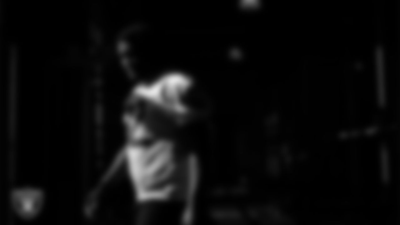 Las Vegas Raiders defensive tackle JJ Pegues (92) walks out to the field for practice at Intermountain Health Performance Center.