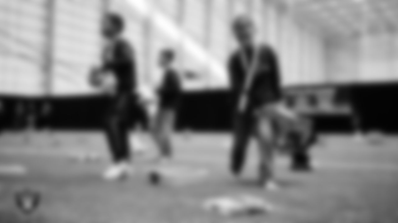 Students select toys during a Raiders Youth Holiday Party at Intermountain Health Performance Center.