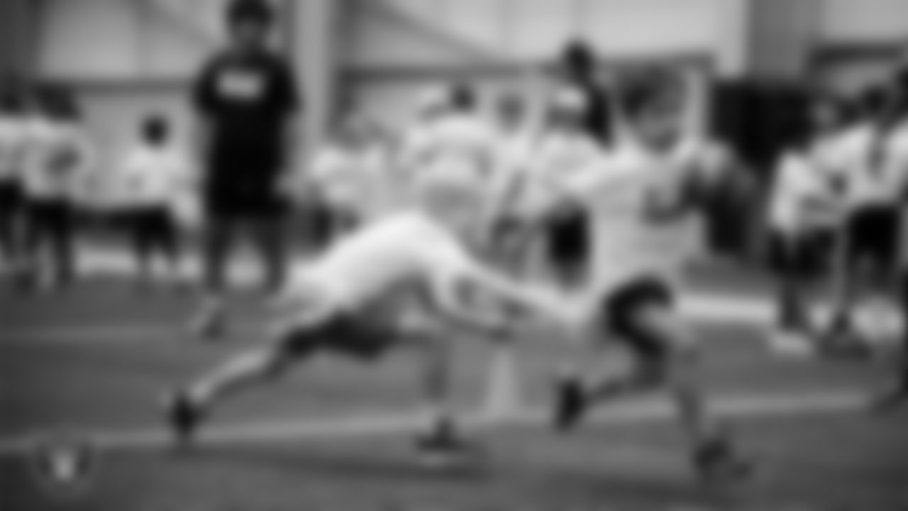 Athletes at a skills camp during Play Football Day at Intermountain Health Performance Center.