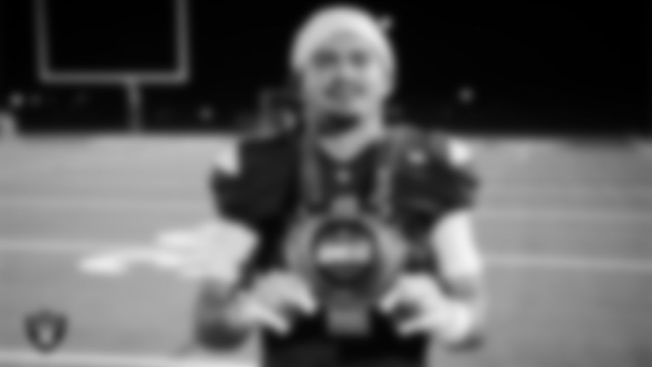 Virgin Valley High School wide receiver and defensive back Ellian Pinto poses with the MVP chain after the Las Vegas Raiders' Football Showcase game at Moapa Valley High School.