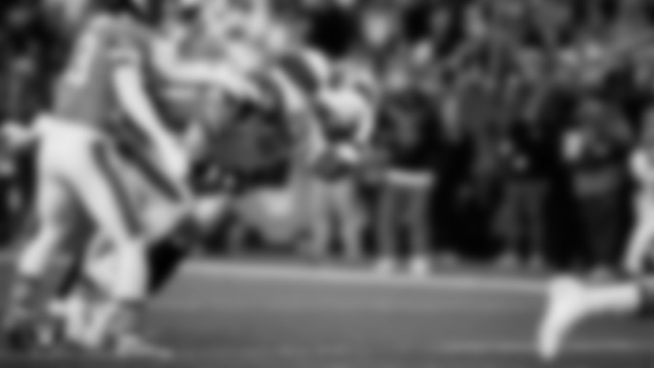 Las Vegas Raiders running back Ashton Jeanty (2) rushes for a 4-yard touchdown during the regular season away game against the Denver Broncos at Empower Field at Mile High.