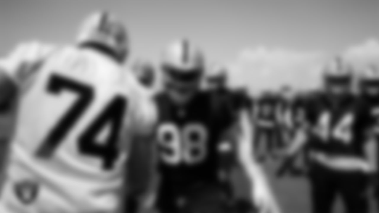 Las Vegas Raiders tackle Kolton Miller (74) and defensive end Maxx Crosby (98) at an Organized Team Activity (OTA) at Intermountain Health Performance Center.