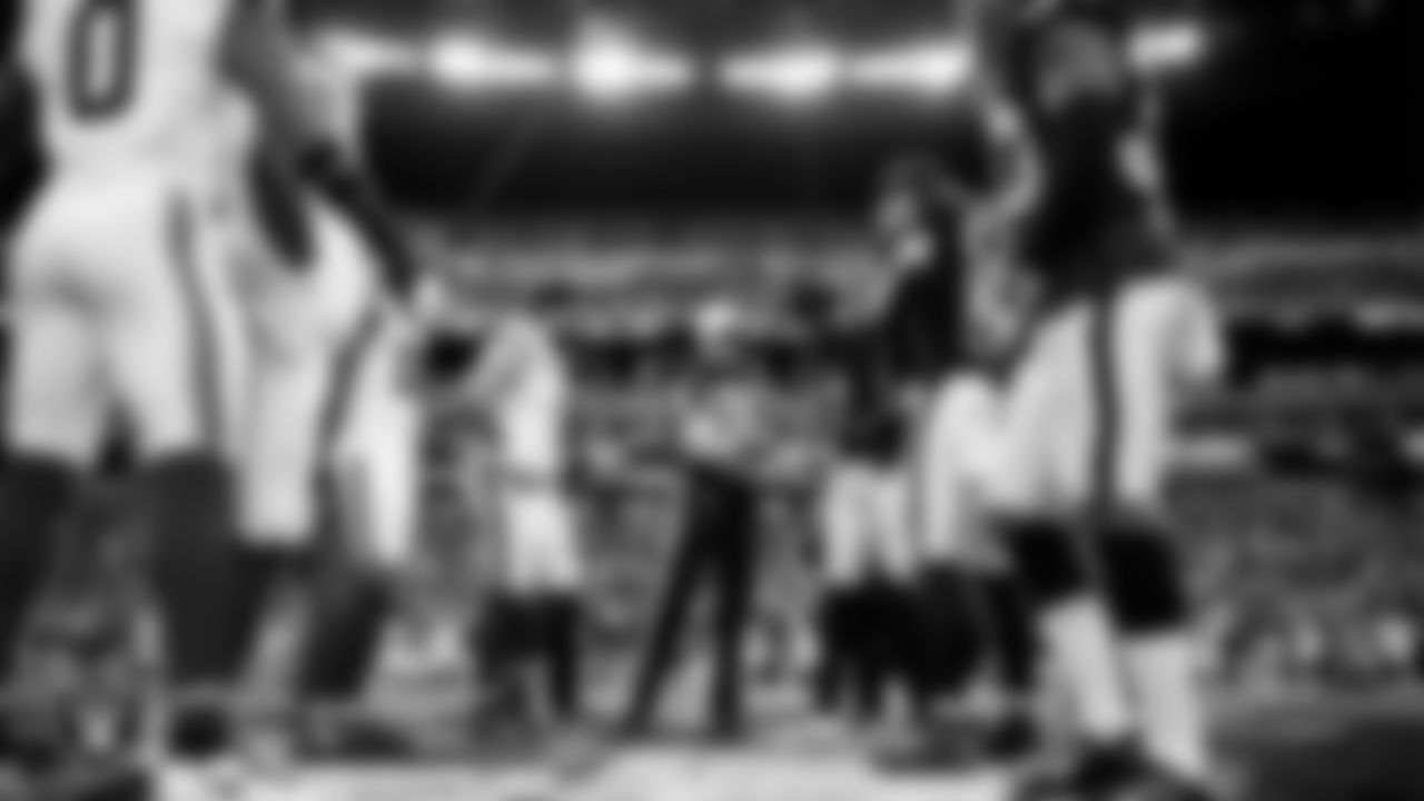 The Las Vegas Raiders during the coin toss before the regular season home game against the New York Giants at Allegiant Stadium.