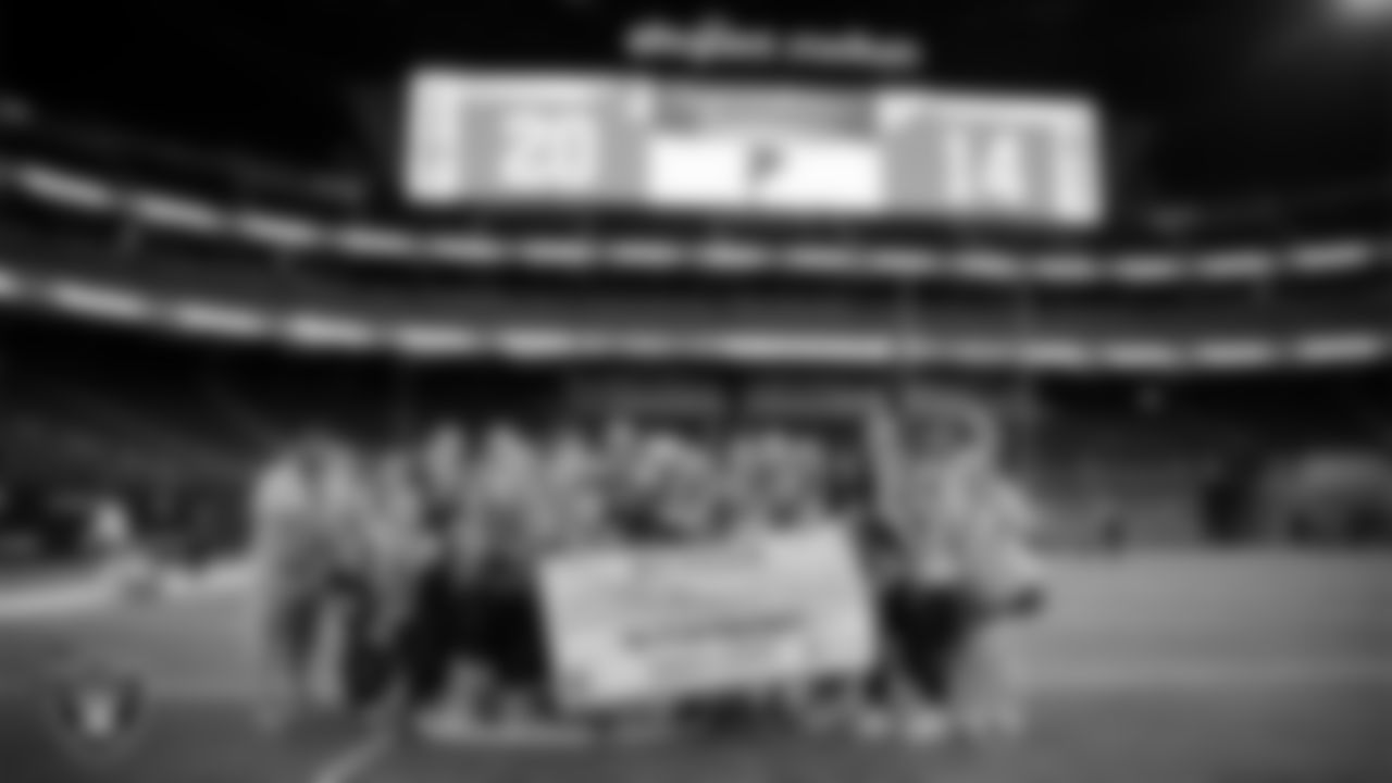 The Foothill High School flag football team poses for a photo after winning the NIAA 4A State Flag Football Championship game against Arbor View High School at Allegiant Stadium.