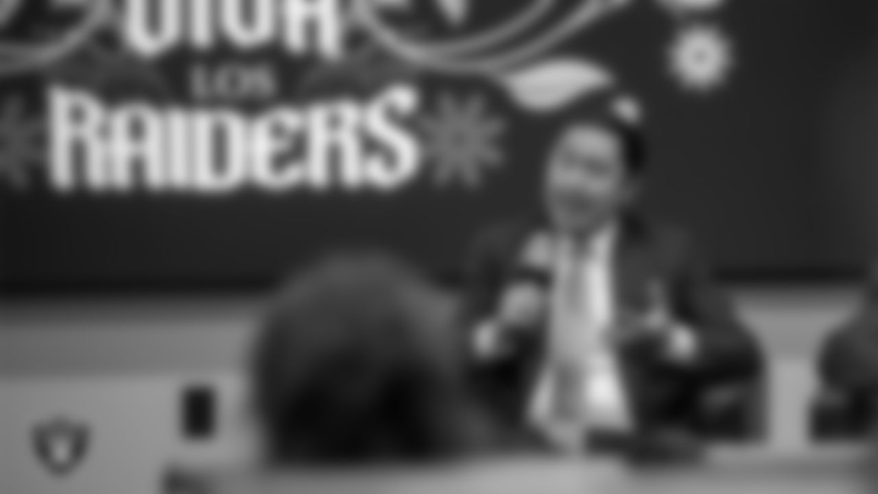 Legal Aid Center of Southern Nevada Directing Attorney of the Immigration Advocacy Project Giovanni Alonso speaks during the Huddle and Grow event at Las Vegas Raiders Headquarters.
