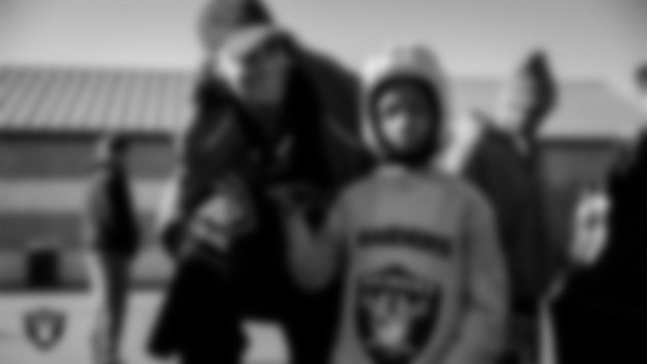 Attendees pose for a photo during Silver and Black Saturday at Liberty High School.