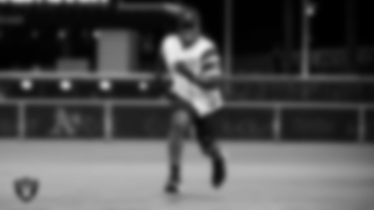 Las Vegas Raiders running back Sincere McCormick (28) runs the bases in the softball game during the Battle For Vegas at Las Vegas Ballpark.