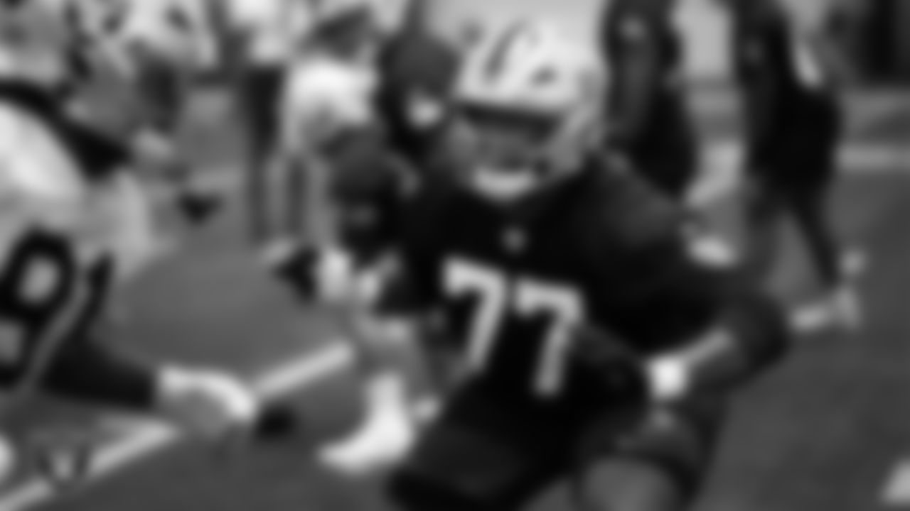 Las Vegas Raiders tackle Leroy Watson IV (77) during practice at Intermountain Health Performance Center.