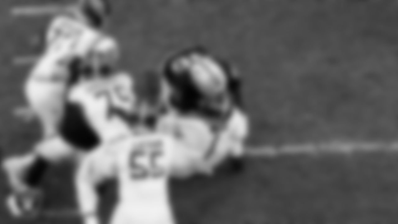 Las Vegas Raiders defensive tackle Jonah Laulu (96) sacks the quarterback during the regular season home game against the Tennessee Titans at Allegiant Stadium.