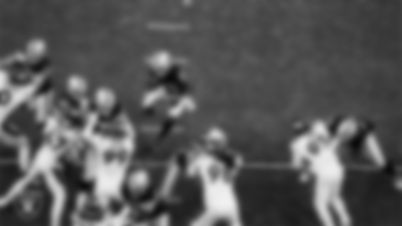 Las Vegas Raiders running back Zamir White (35) rushes during the regular season home game against the Denver Broncos at Allegiant Stadium.