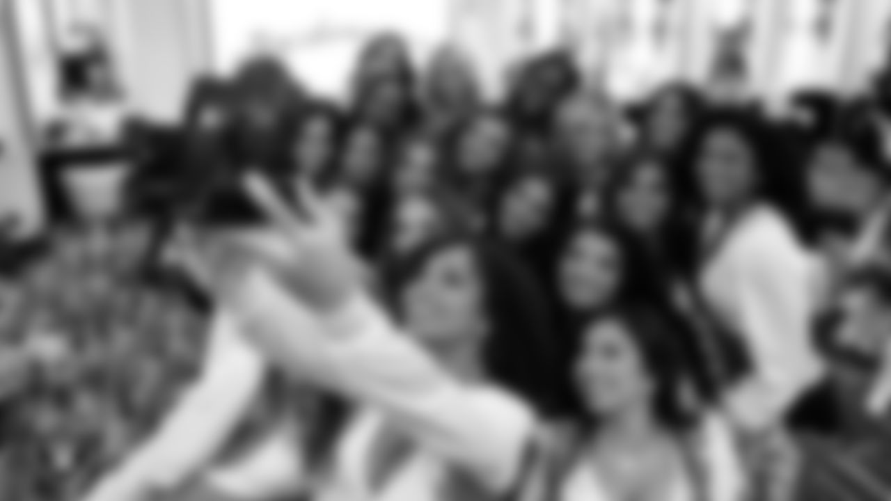 The Raiderettes pose for a photo in the locker room before the regular season home game against the Pittsburgh Steelers at Allegiant Stadium.