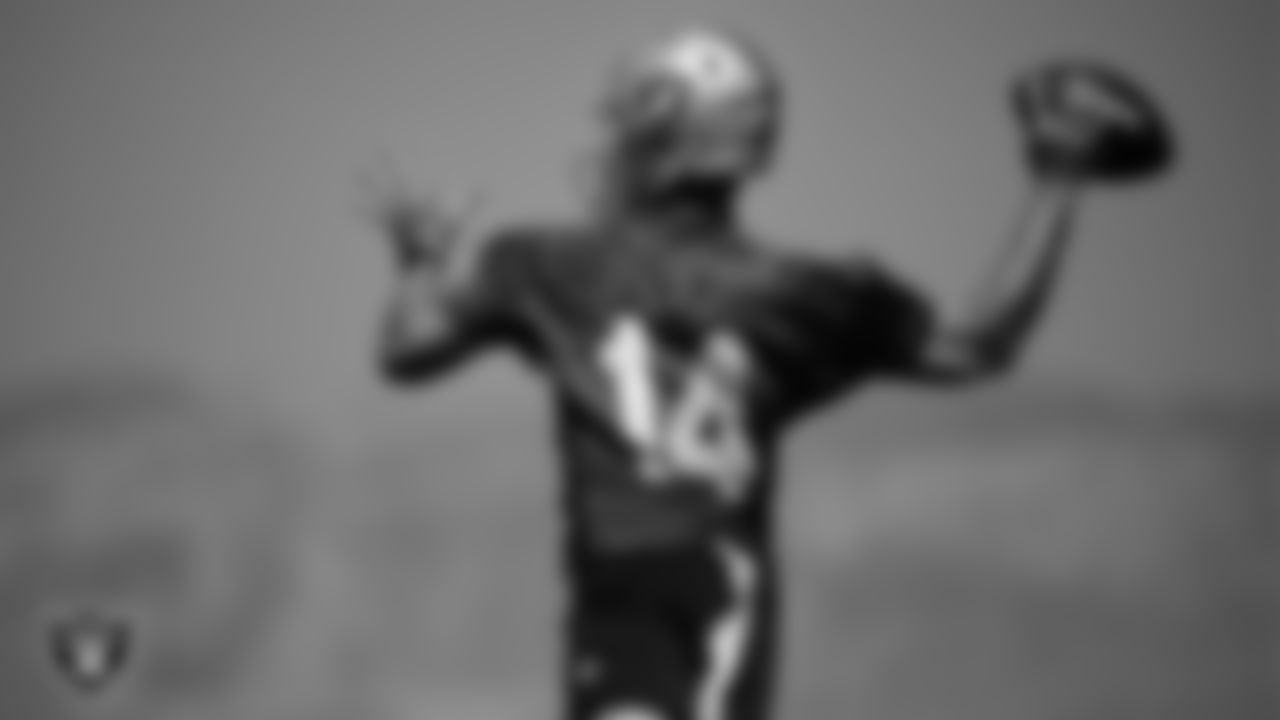 Las Vegas Raiders quarterback Carter Bradley (14) on the field for mandatory minicamp at Intermountain Health Performance Center.