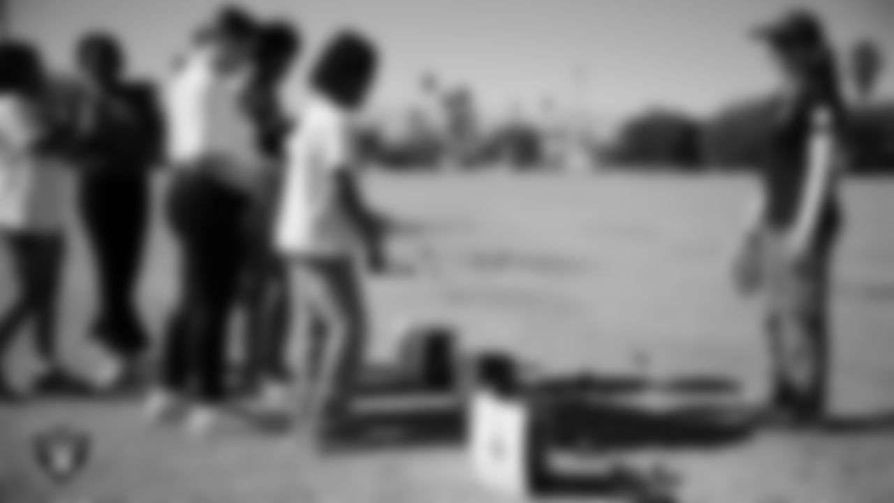 Students participate in activities while learning about flag football, nutrition and mental health during the R.U.S.H. program at J.D. Smith Middle School.