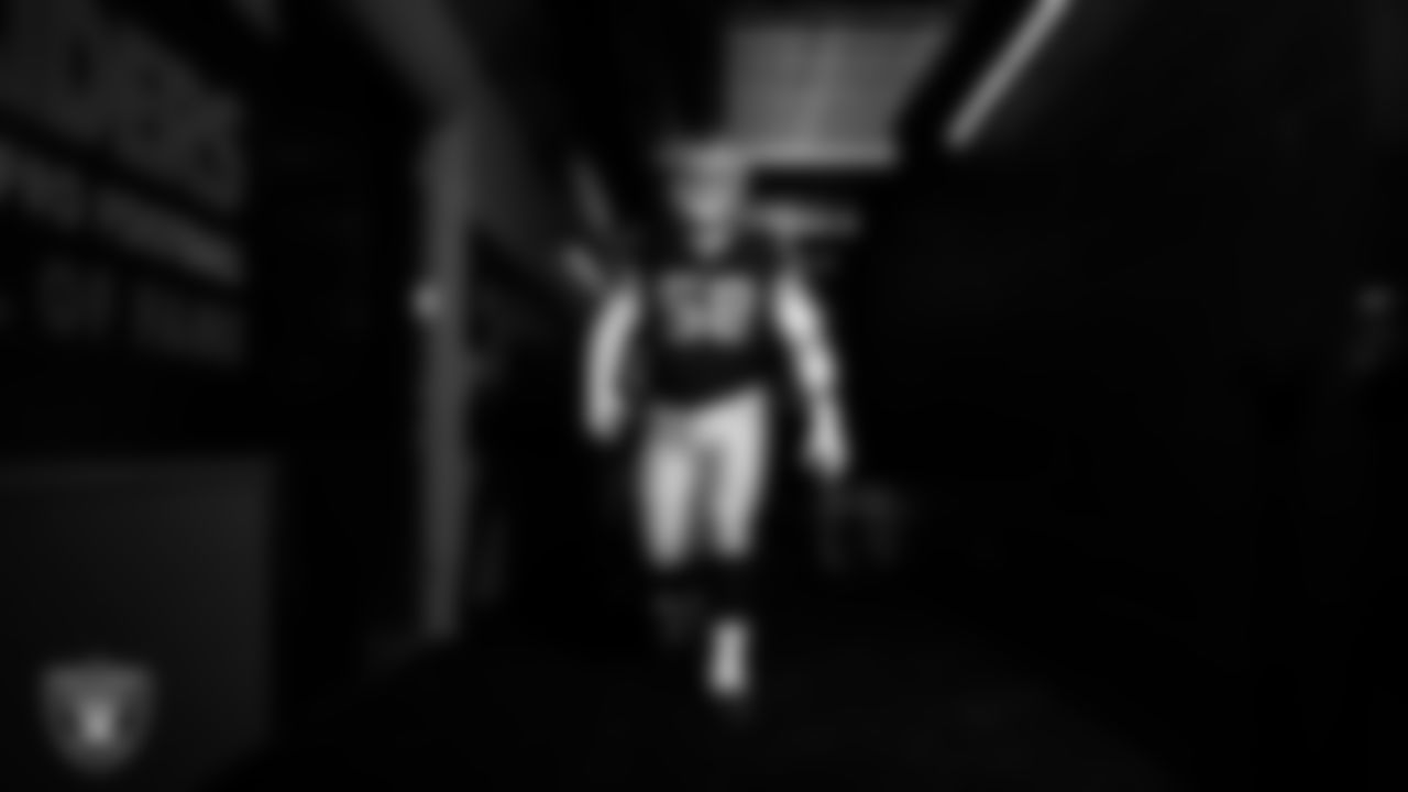 Las Vegas Raiders center Jackson Powers-Johnson (58) walks down the tunnel before the regular season home game against the Tennessee Titans at Allegiant Stadium.