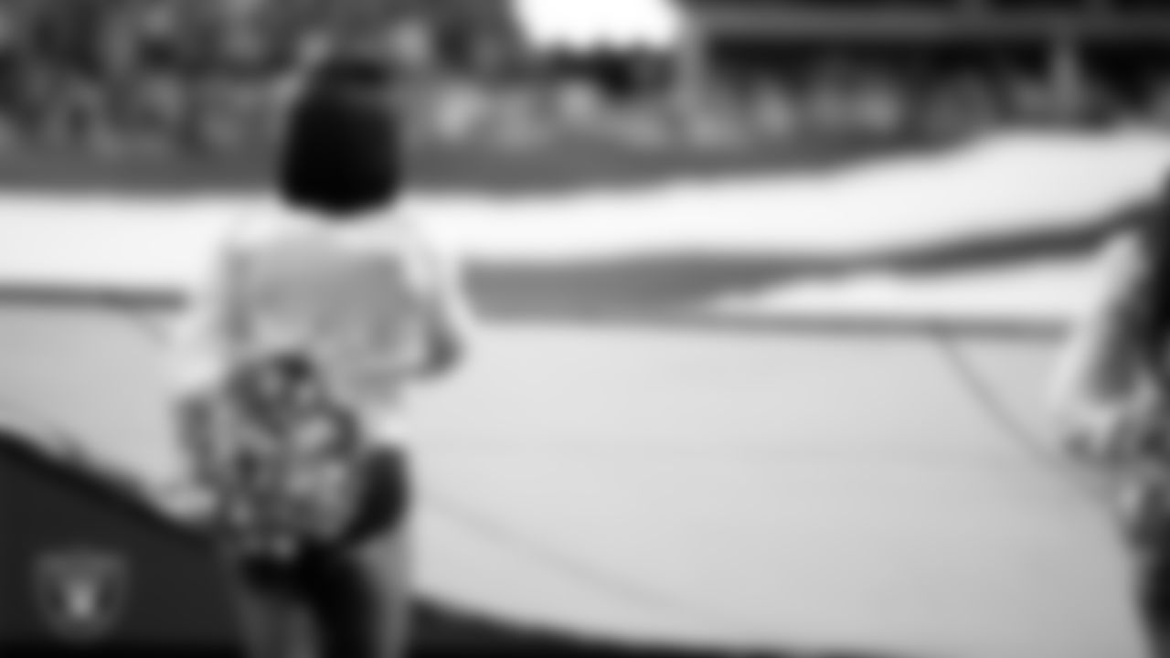 Raiderette Kylie during the national anthem before the regular season home game against the Los Angeles Chargers at Allegiant Stadium.