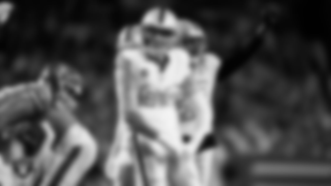 Las Vegas Raiders defensive end Maxx Crosby (98) celebrates after making a tackle during the regular season away game against the Denver Broncos at Empower Field at Mile High.