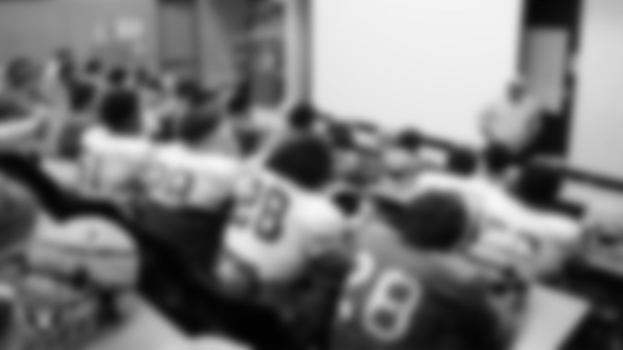 Las Vegas Raiders senior manager of football development Jordan Aguilar talks to the Bishop Gorman High School football team before a practice at Bishop Gorman High School.