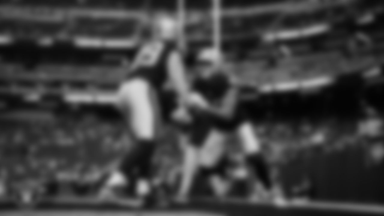 Las Vegas Raiders tight end Brock Bowers (89) and tight end Carter Runyon (46) warming up before the regular season home game against the Denver Broncos at Allegiant Stadium.