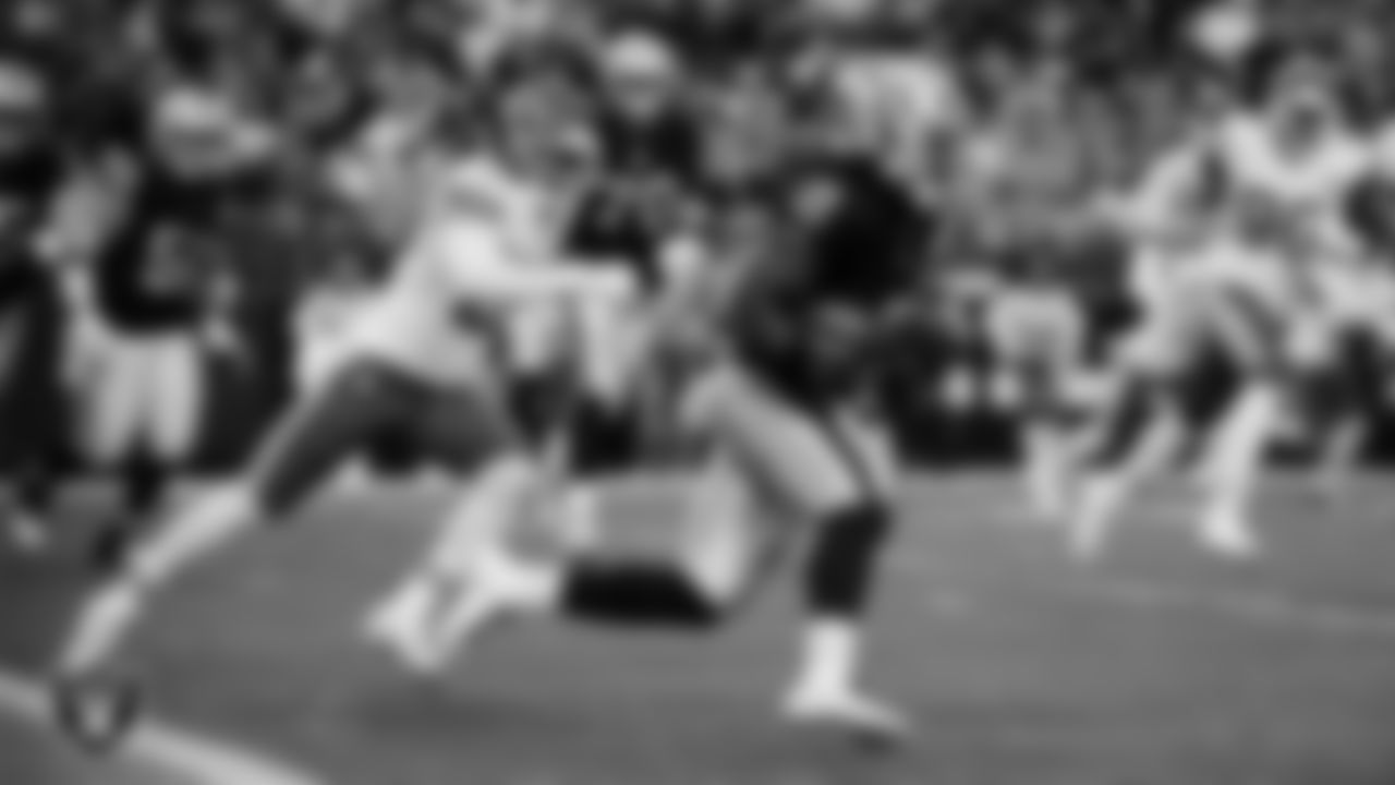 Las Vegas Raiders running back Ashton Jeanty (2) rushes during the regular season home game against the Kansas City Chiefs at Allegiant Stadium.