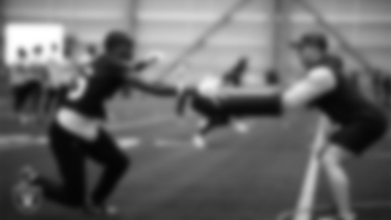 Las Vegas Raiders cornerback Kyu Blu Kelly (36) and offensive quality control coach Conner McQueen at a workout during phase two of the offseason program at Intermountain Health Performance Center.